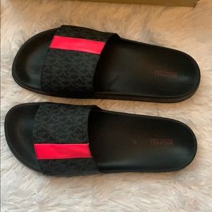 Michael Kors Black slides with hot pink stripe